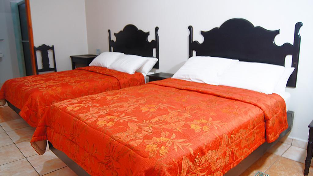 Uw Oasis Hotel La Ceiba Szoba fotó