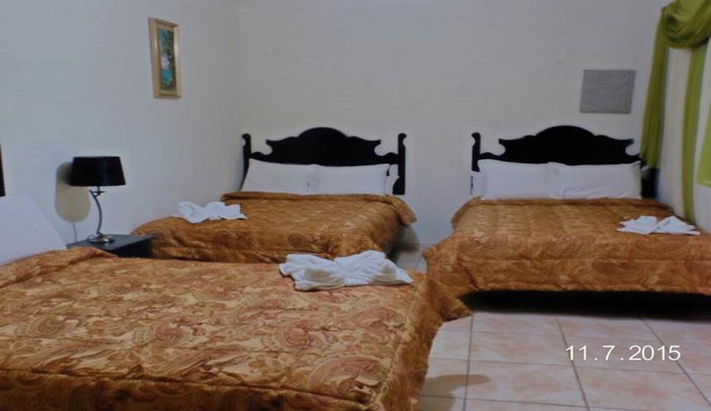 Uw Oasis Hotel La Ceiba Szoba fotó